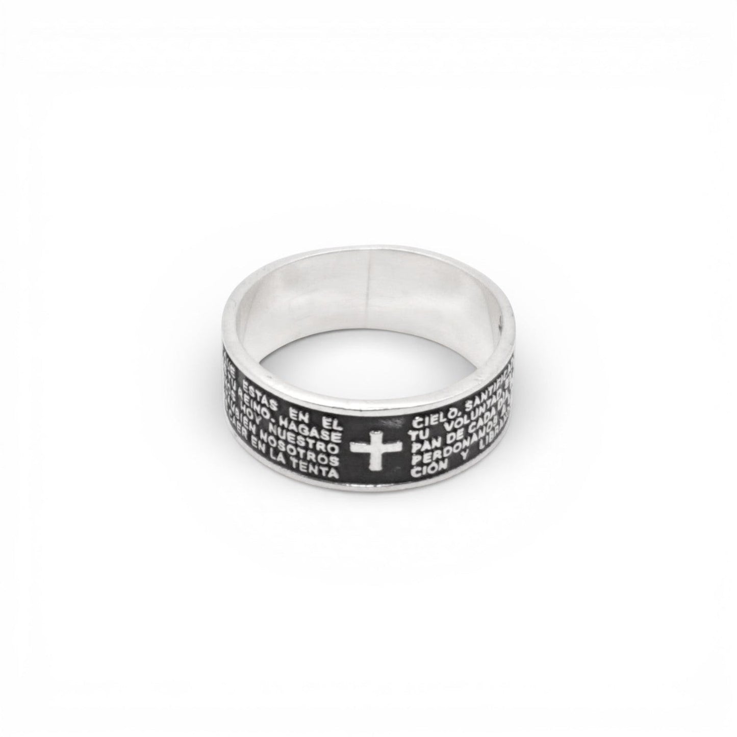Bague en argent massif de la boutique Altiplano, ornée d'une croix et de gravures en espagnol.