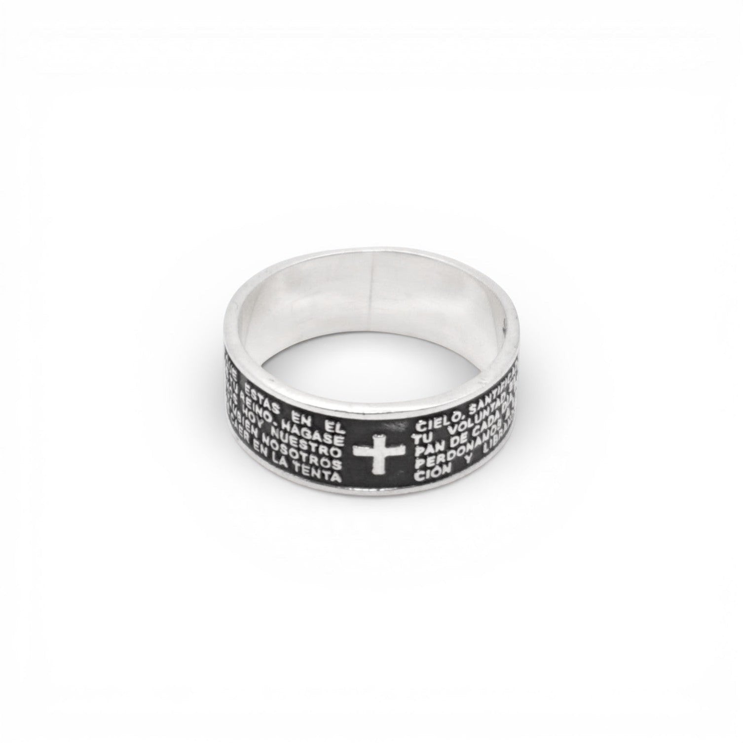 Bague en argent massif de la boutique Altiplano, ornée d'une croix et de gravures en espagnol.